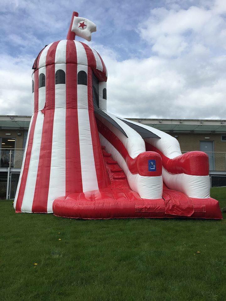 Our inflatable Helter Skelter slide set up for a fun day event in Leigh Our inflatable Helter Skelter slide set up for a fun day event in Leigh